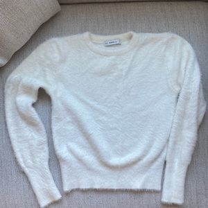 White furry sweater